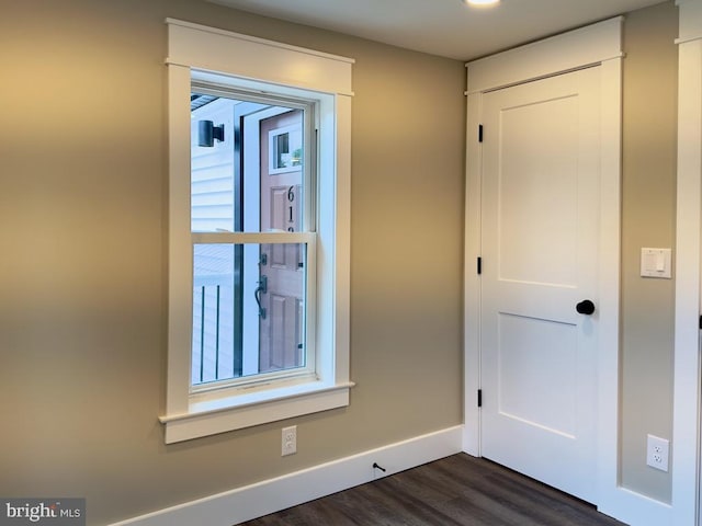 interior space with dark wood-type flooring