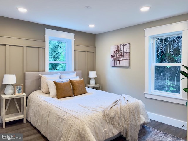 bedroom featuring dark hardwood / wood-style flooring