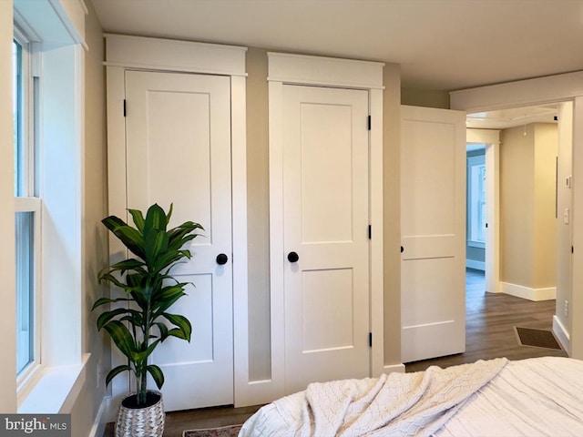 bedroom featuring dark hardwood / wood-style floors