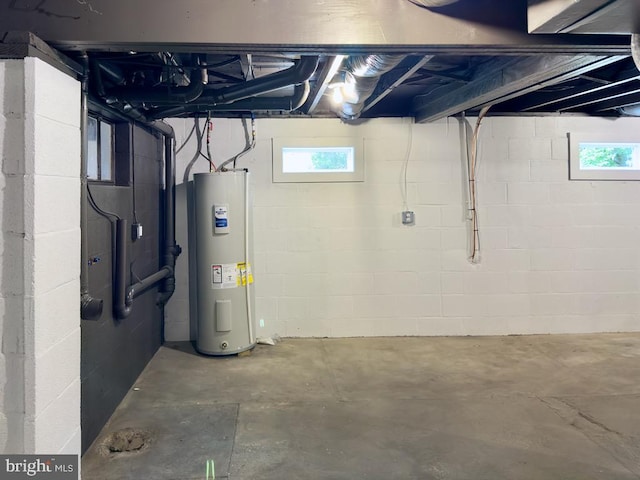 basement featuring electric water heater