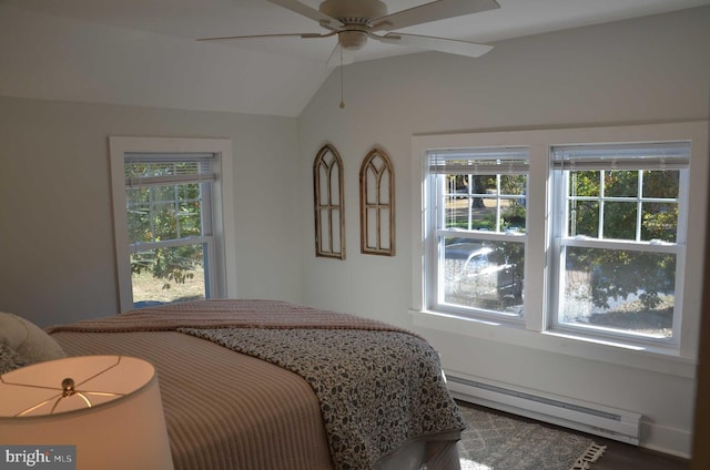 bedroom with ceiling fan, vaulted ceiling, multiple windows, and a baseboard radiator