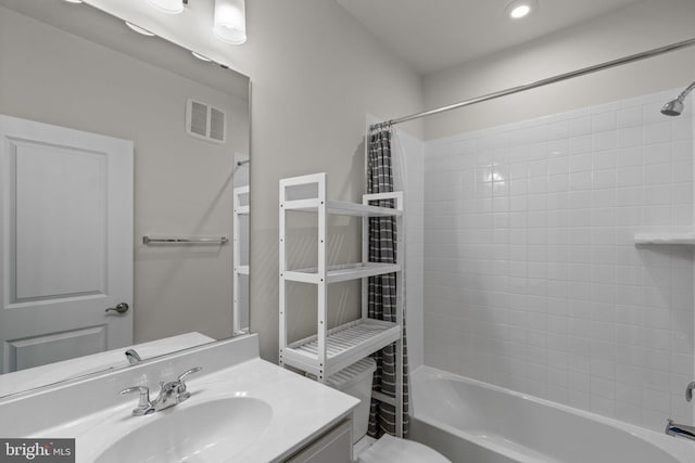 full bathroom featuring vanity, toilet, and shower / bathtub combination with curtain