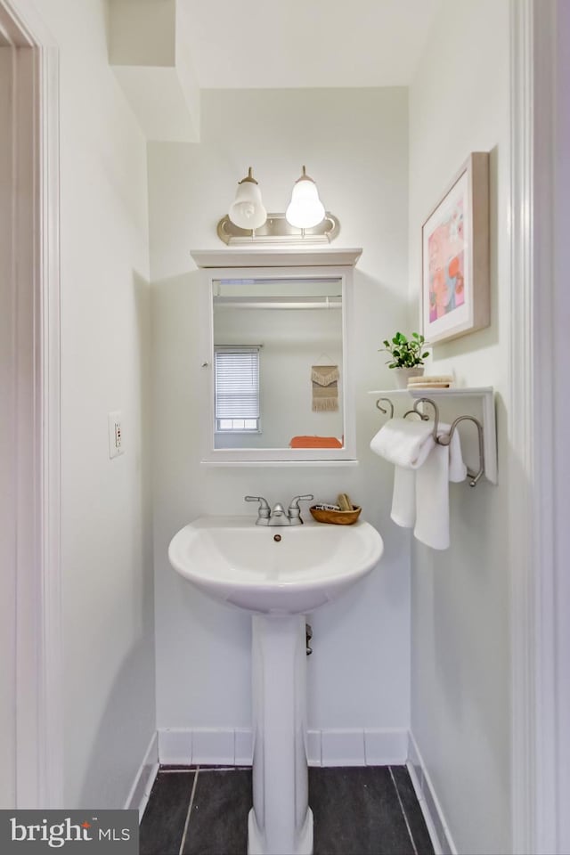 bathroom with tile patterned flooring