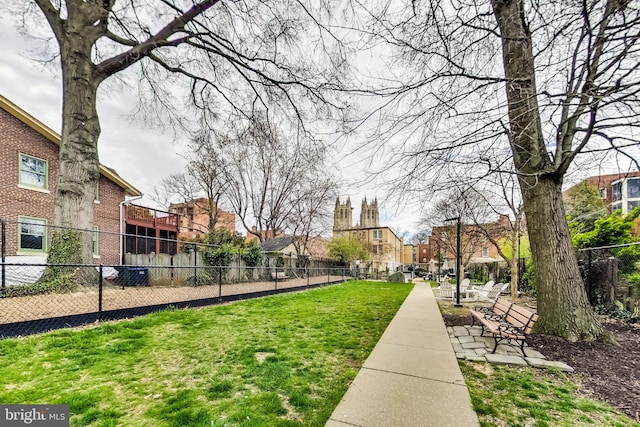 view of home's community featuring a yard