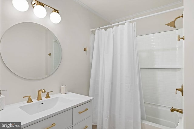 bathroom with vanity, crown molding, and shower / bath combo