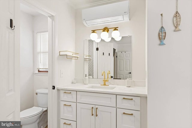 bathroom featuring vanity, crown molding, a wall mounted air conditioner, and toilet