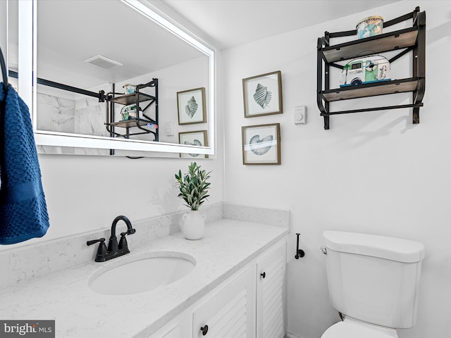11204 Coastal Hwy Unit 9H, Ocean City, MD 21842 - bathroom featuring vanity, toilet, and visible vents