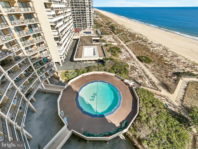 aerial view with a view of the beach and a water view