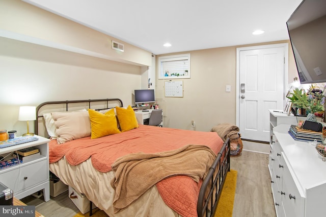 bedroom featuring light wood-type flooring