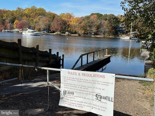 dock area featuring a water view