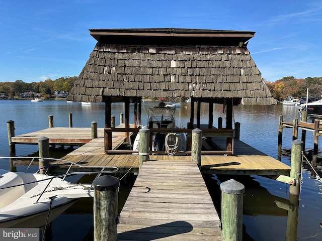 view of dock with a water view