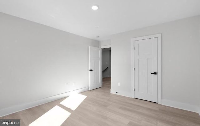 unfurnished bedroom featuring light hardwood / wood-style flooring