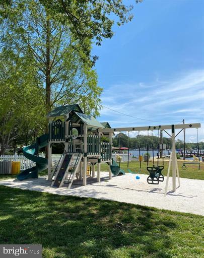 view of play area featuring a yard