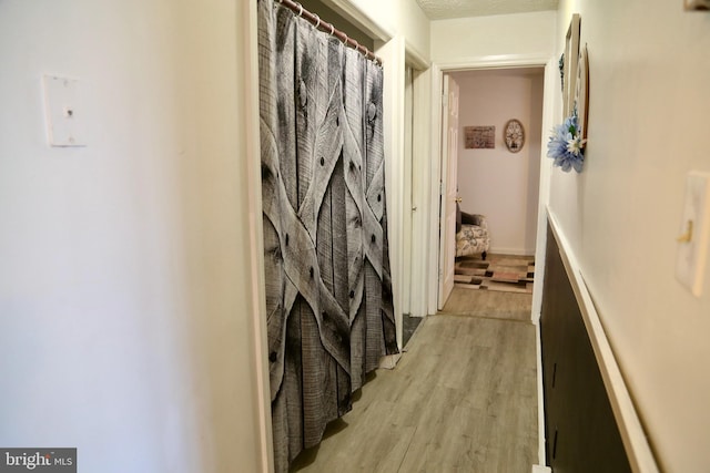 hall featuring light wood-type flooring