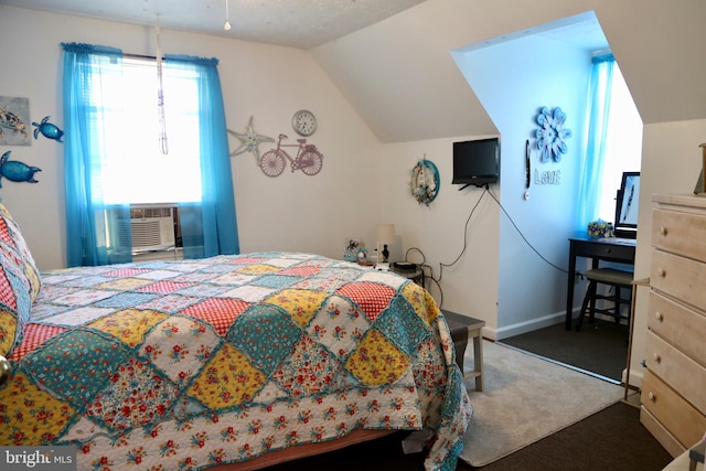 carpeted bedroom with lofted ceiling