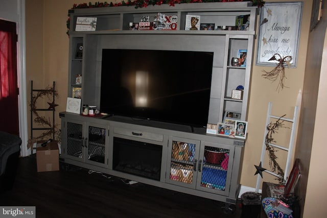 living room with dark wood-type flooring