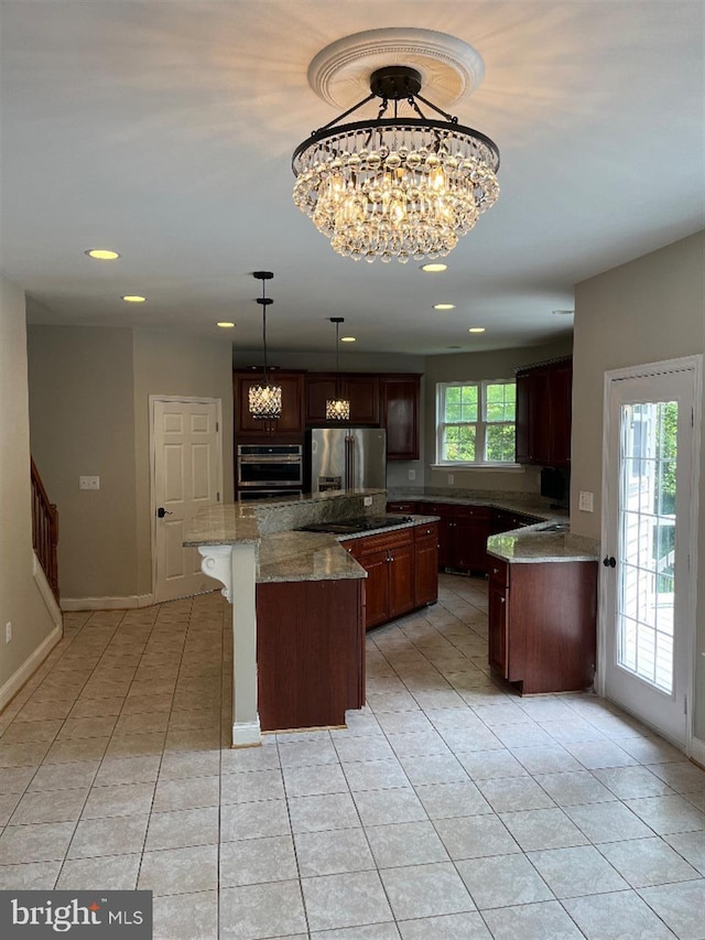 kitchen featuring a kitchen island, stainless steel appliances, pendant lighting, light tile patterned floors, and light stone counters