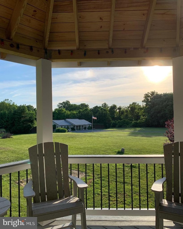 exterior space featuring a gazebo and a lawn