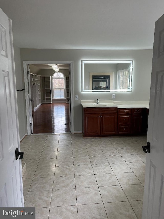 bathroom with vanity and tile patterned flooring