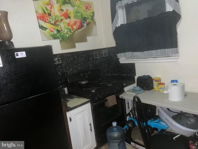 bathroom with tasteful backsplash