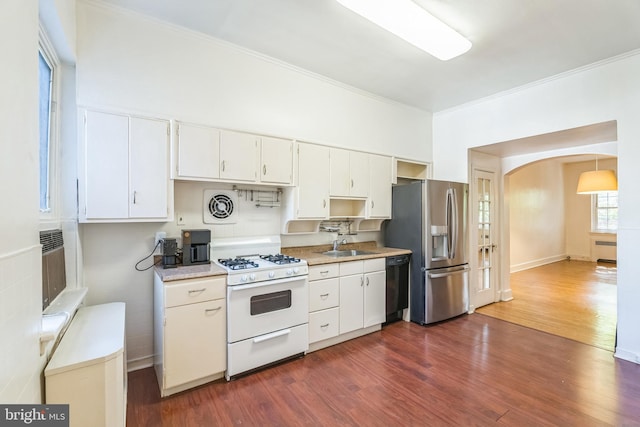 kitchen with black dishwasher, stainless steel fridge with ice dispenser, white cabinetry, dark hardwood / wood-style floors, and white range with gas stovetop