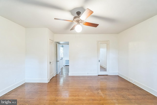 unfurnished room with light hardwood / wood-style floors and ceiling fan