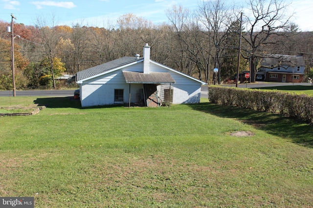 exterior space featuring a yard