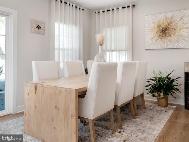 dining area featuring hardwood / wood-style flooring