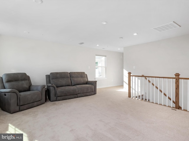 living room with light carpet