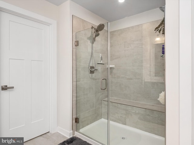 bathroom with an enclosed shower