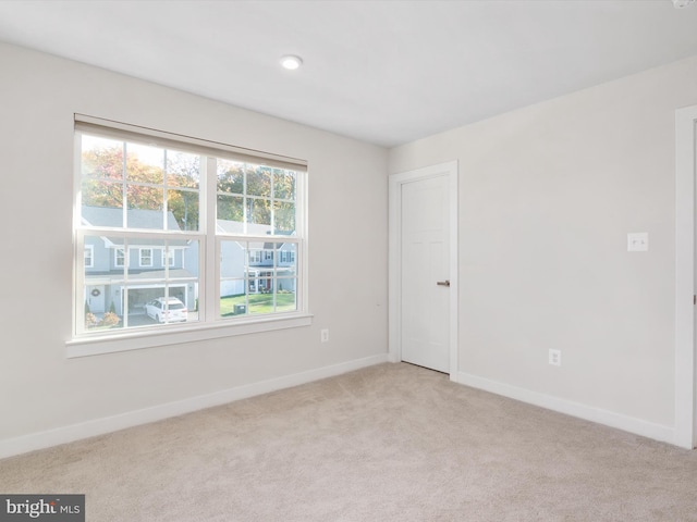 view of carpeted spare room