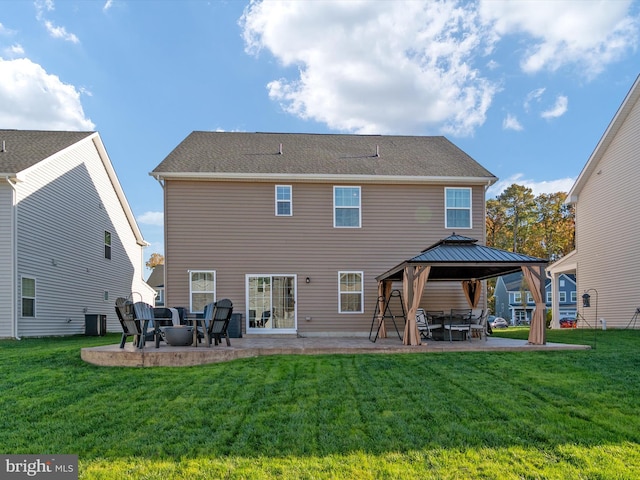 back of property featuring a gazebo, a patio area, a lawn, and cooling unit