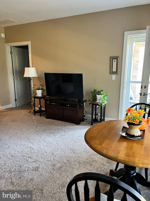 living room with light carpet