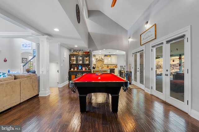 game room featuring pool table, french doors, decorative columns, vaulted ceiling, and dark wood-type flooring