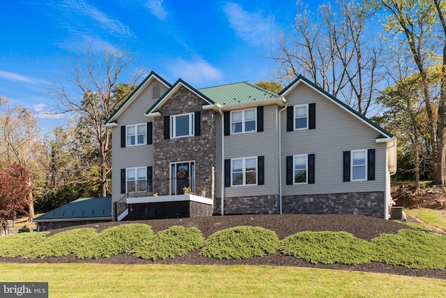 view of front facade featuring a front yard