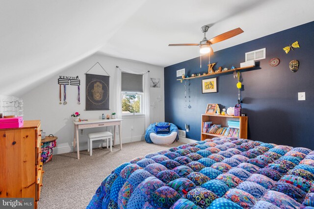 carpeted bedroom with ceiling fan and lofted ceiling