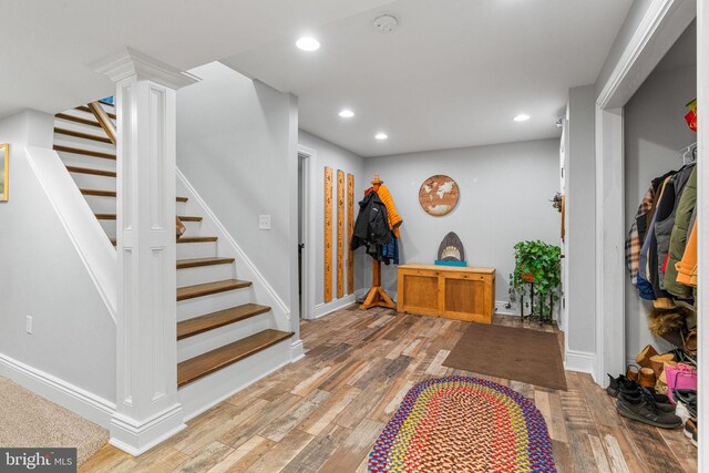 foyer entrance with wood-type flooring