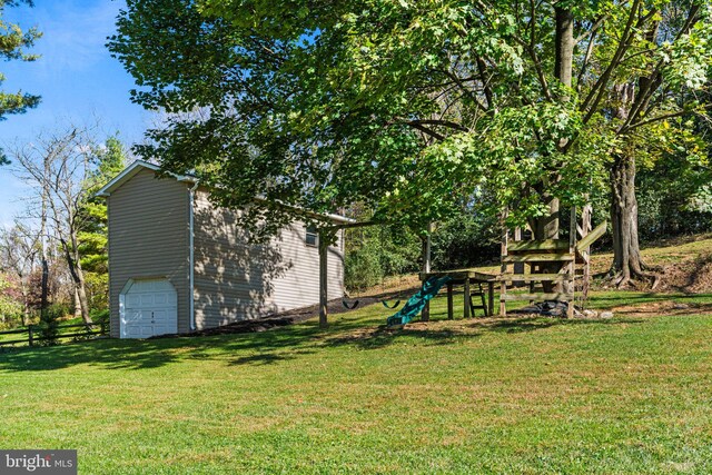 view of yard featuring a garage