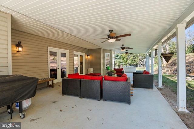 view of patio / terrace featuring french doors, ceiling fan, area for grilling, and outdoor lounge area