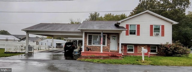 view of front of property with a carport