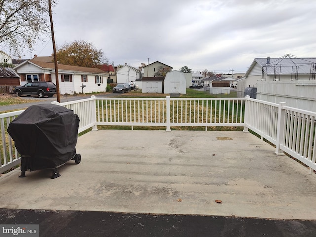 view of patio featuring a grill