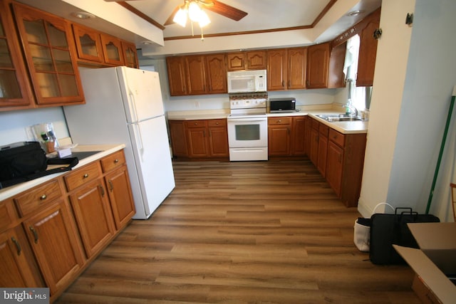 kitchen with hardwood / wood-style floors, sink, ornamental molding, ceiling fan, and white appliances