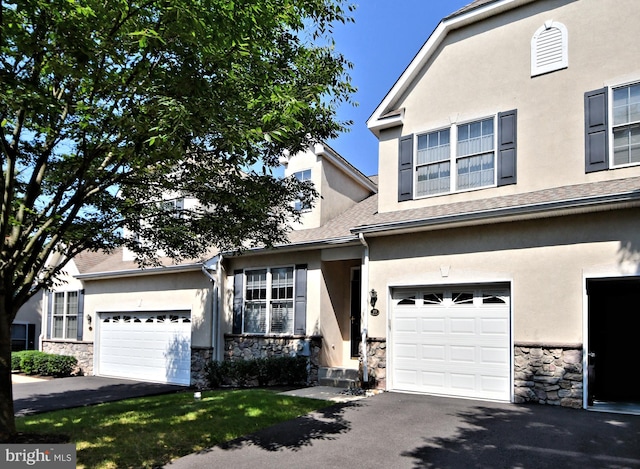 view of front of home with a garage