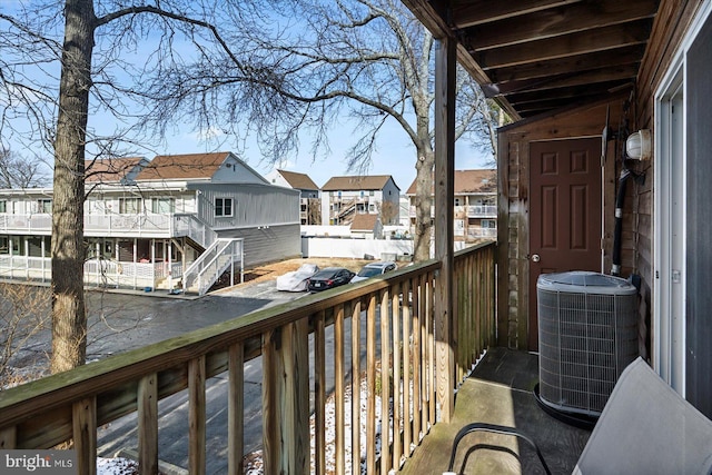 balcony with a residential view and central AC