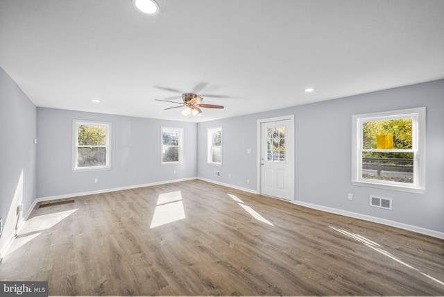 unfurnished room featuring wood-type flooring and ceiling fan