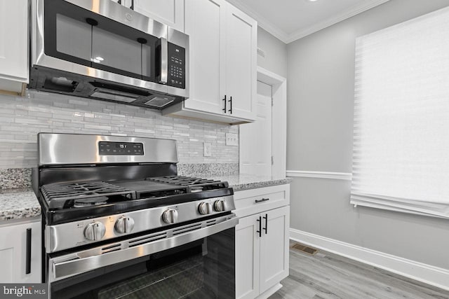 kitchen with white cabinets and stainless steel appliances