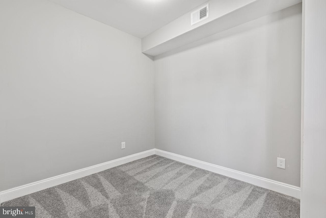 unfurnished room featuring carpet flooring