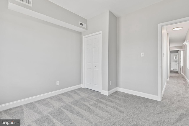 empty room with light carpet