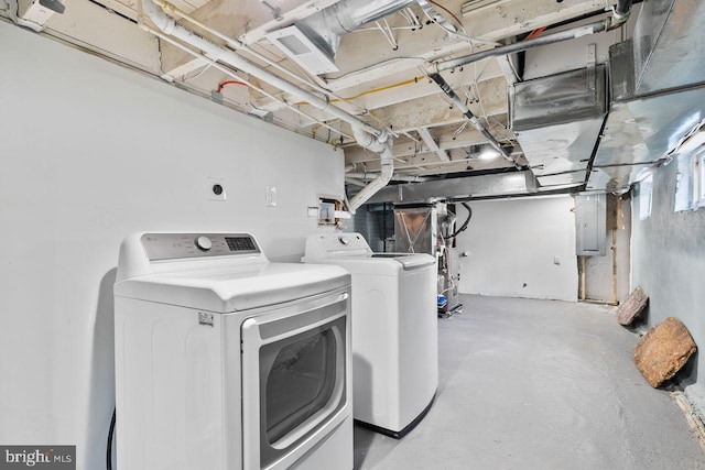 laundry room featuring separate washer and dryer