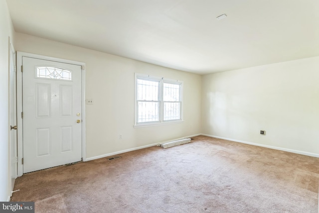 entryway with light carpet